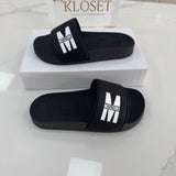 MOSCHINO BLACK AND WHITE SLIDERS